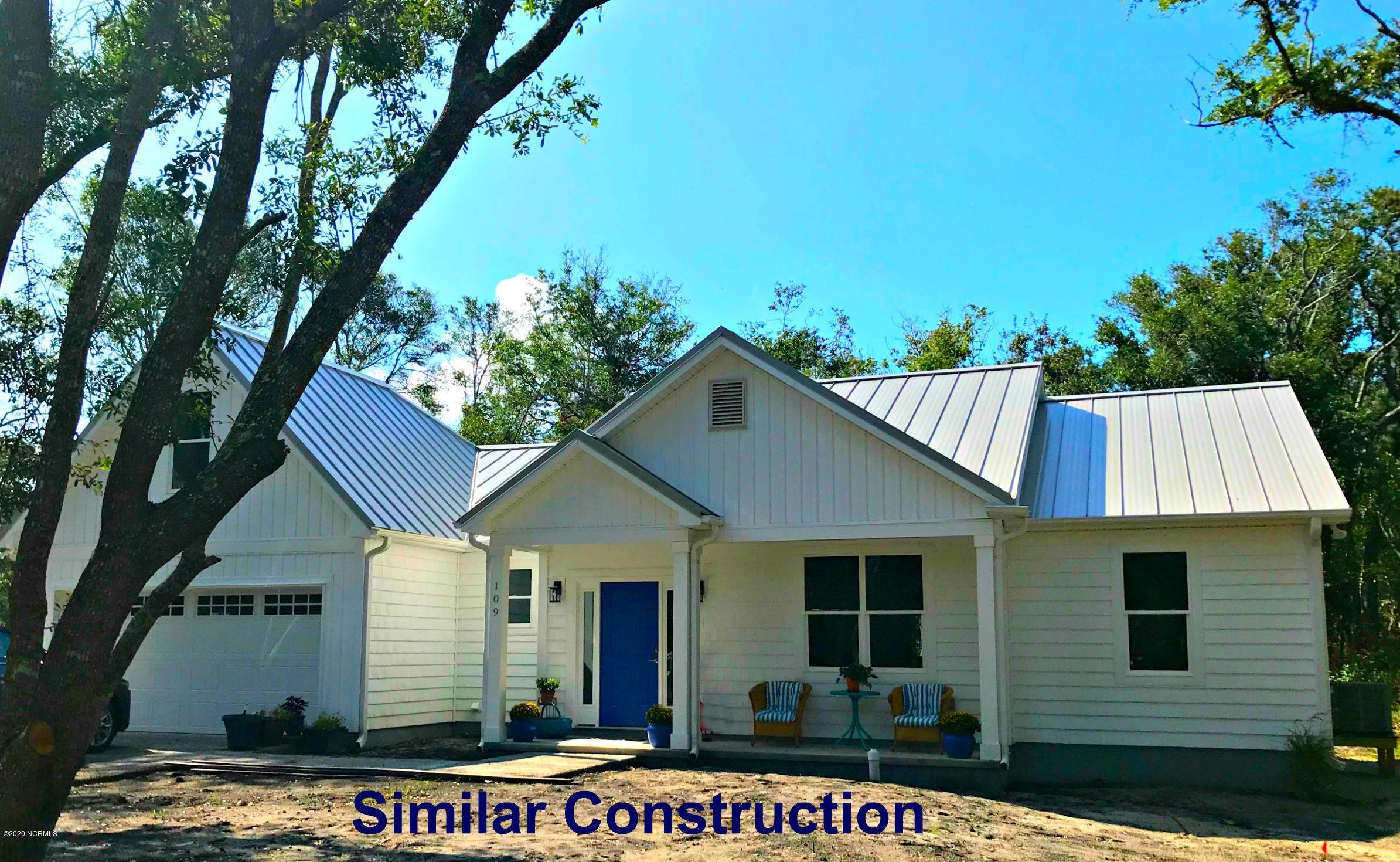 Single Family Homes por un Venta en 104 Evergreen Lane Pine Knoll Shores, Carolina Del Norte 28512 Estados Unidos