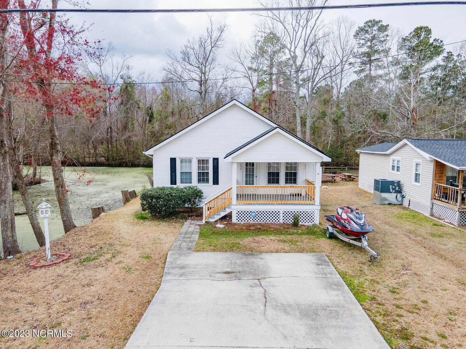 1. Single Family Homes for Sale at 1898 Waccamaw Shores Road Lake Waccamaw, North Carolina 28450 United States