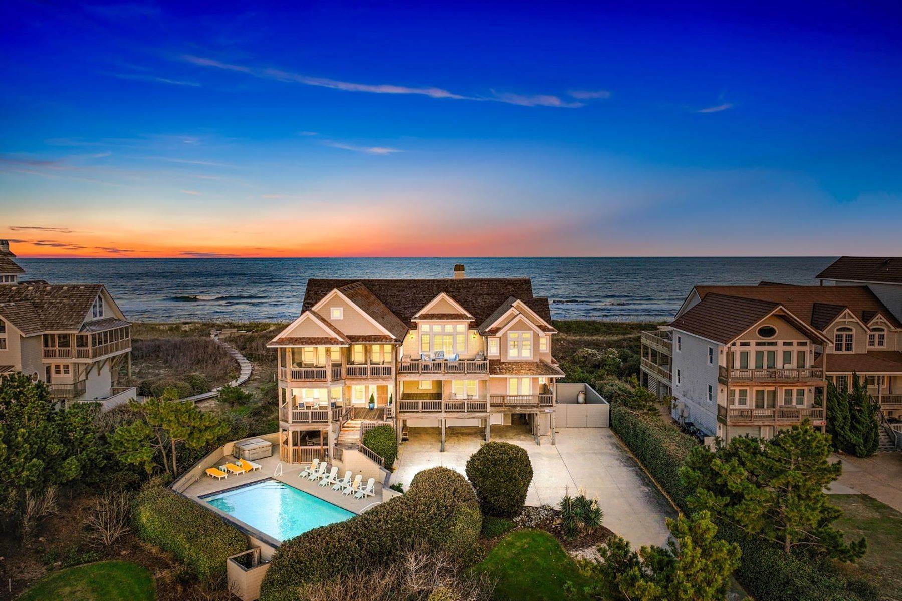 Single Family Homes for Sale at Spectacular Palmer's Island Oceanfront Estate 112 S Baum Trail Duck, North Carolina 27949 United States